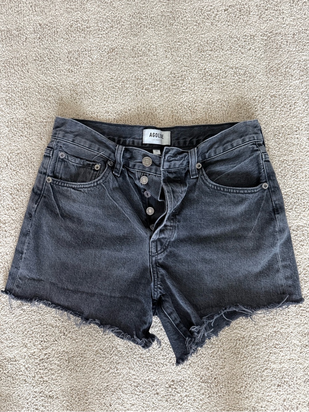 AGOLDE Parker Vintage Cut-Off Shorts in a washed black/charcoal color, size 25